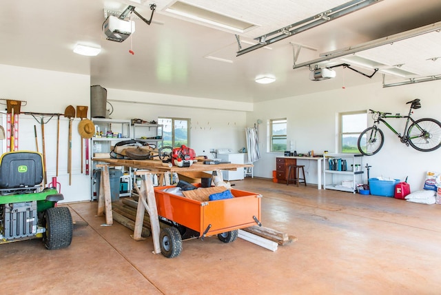 4737-C Koloa Rd Unit 6, Koloa, HI 96756 - garage with a workshop area and a garage door opener
