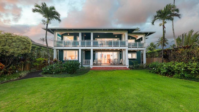 5390 Weke Rd, Hanalei, HI 96722 - back of property at dusk with a balcony