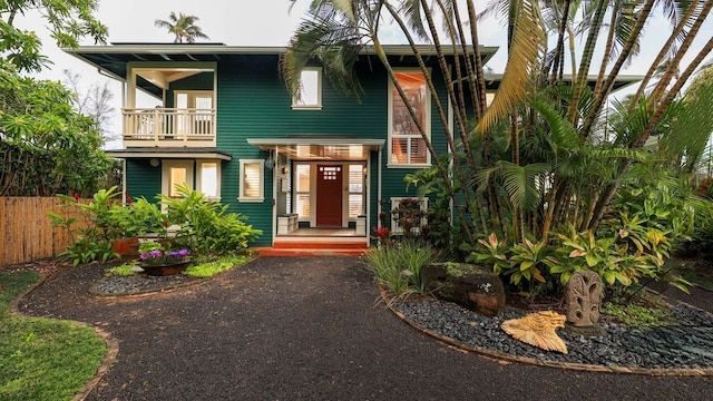 5390 Weke Rd, Hanalei, HI 96722 - view of front of property with a balcony and asphalt driveway