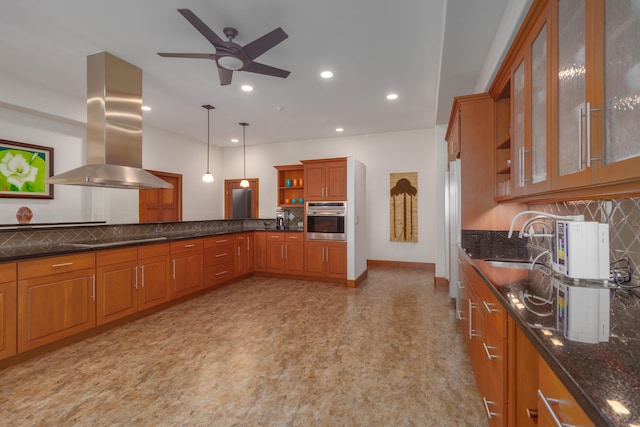 82-1171 Meli Rd, Captain Cook, HI 96704 - kitchen with stainless steel oven, island exhaust hood, open shelves, a sink, and brown cabinets