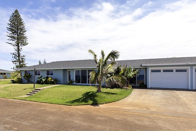 56-102 Old Coast Guard Rd, Hawi, HI 96719 - ranch-style house featuring driveway, a front yard, and an attached garage