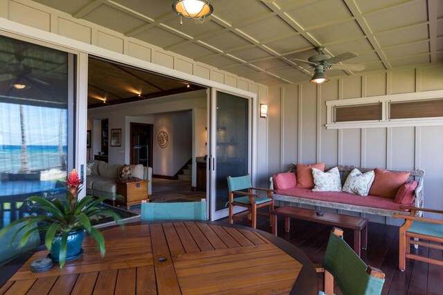 69-1648 Puako Beach Dr, Kamuela, HI 96743 - wooden deck with an outdoor hangout area and a ceiling fan