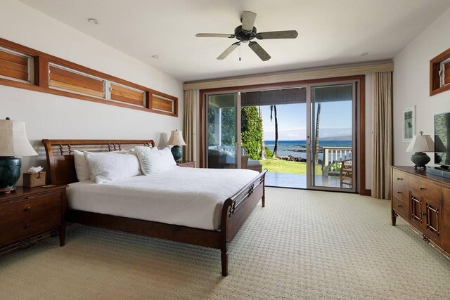 69-1648 Puako Beach Dr, Kamuela, HI 96743 - bedroom with access to exterior, light carpet, and a ceiling fan