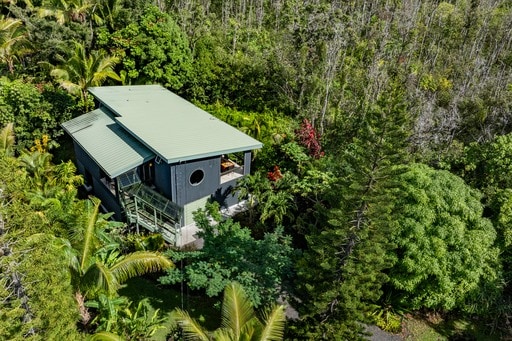 12-7002 Hoeunalu St, Pahoa, HI 96778 - view of subject property featuring a heavily wooded area