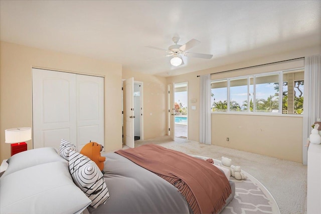 75-389 Hoene St, Kailua-Kona, HI 96740 - bedroom featuring carpet floors, a closet, and a ceiling fan