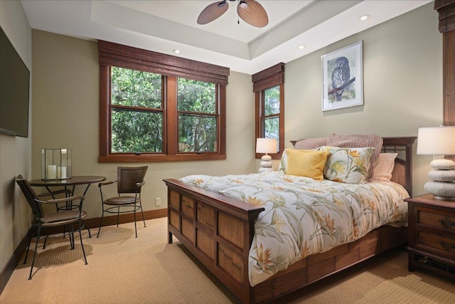 78-7024 Ola Mau St, Kailua-Kona, HI 96740 - bedroom with multiple windows, light colored carpet, a raised ceiling, and recessed lighting