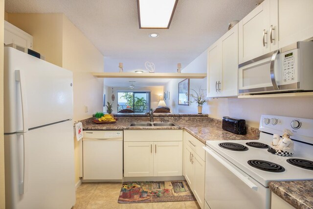 77-6585 Seaview Cir Unit 104, Kailua-Kona, HI 96740 - kitchen featuring white appliances, a sink, white cabinetry, and recessed lighting