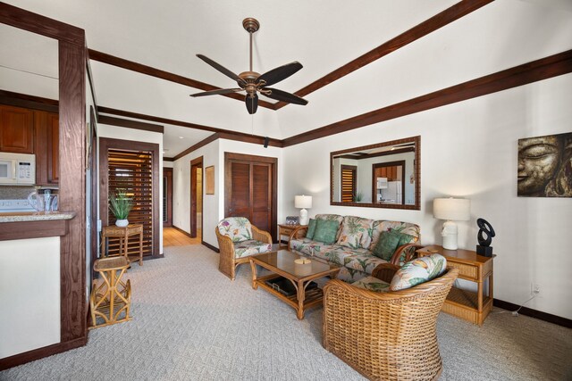 2253 Poipu Rd Unit 101, Koloa, HI 96756 - living room with a ceiling fan, light colored carpet, and baseboards