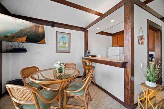 2253 Poipu Rd Unit 101, Koloa, HI 96756 - dining room with light colored carpet, recessed lighting, and beam ceiling