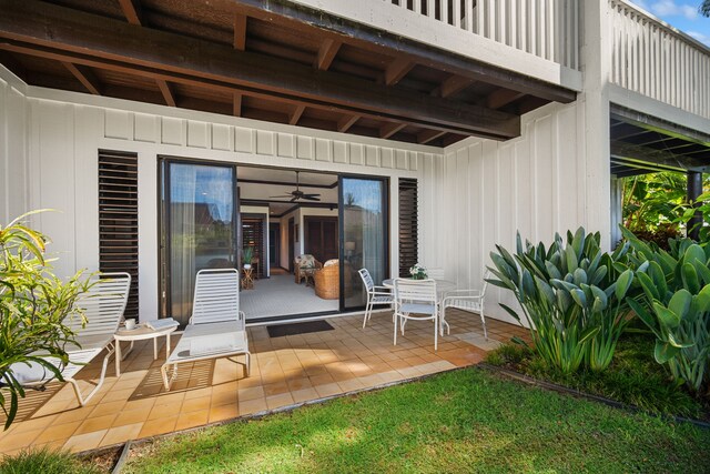 2253 Poipu Rd Unit 101, Koloa, HI 96756 - doorway to property with board and batten siding and a patio