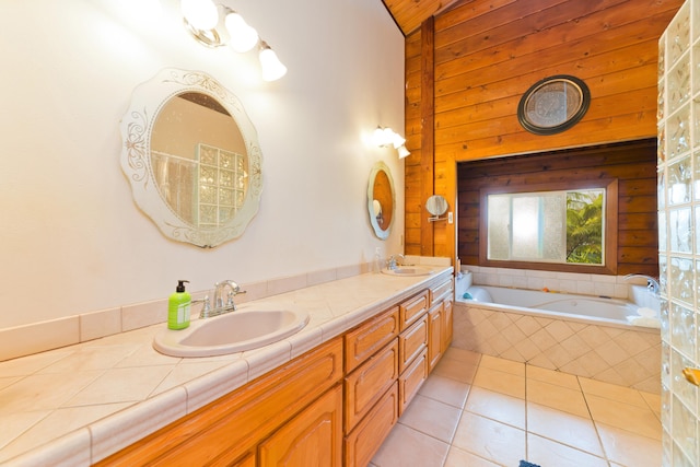 93-7015 Kamaoa Rd, Naalehu, HI 96772 - full bathroom featuring double vanity, a relaxing tiled tub, tile patterned flooring, and lofted ceiling