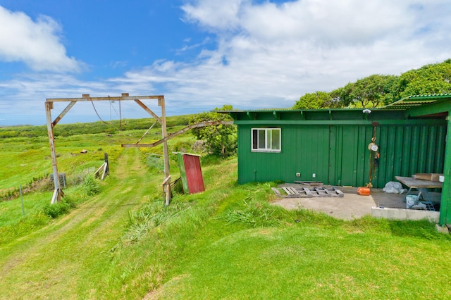 93-7015 Kamaoa Rd, Naalehu, HI 96772 - view of yard with a patio