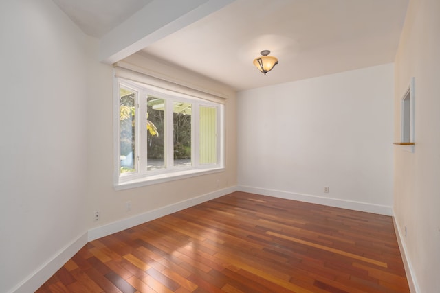99-1775 Pukeawe Cir, Volcano, HI 96785 - unfurnished room with hardwood / wood-style floors and baseboards