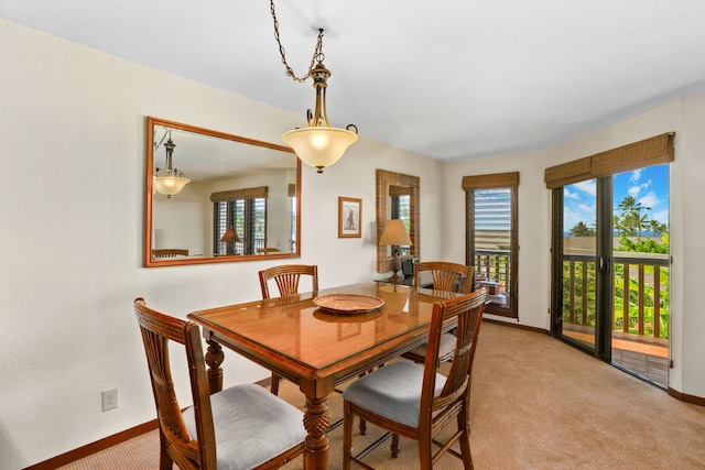 1870 Hoone Rd Unit 803, Koloa, HI 96756 - dining room with light colored carpet, plenty of natural light, and baseboards