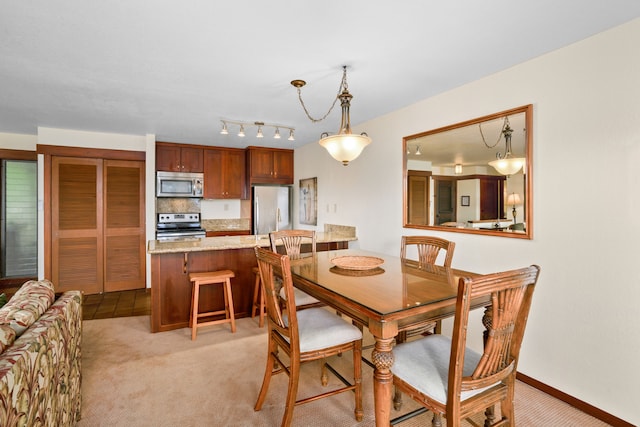 1870 Hoone Rd Unit 803, Koloa, HI 96756 - dining area with light colored carpet and baseboards