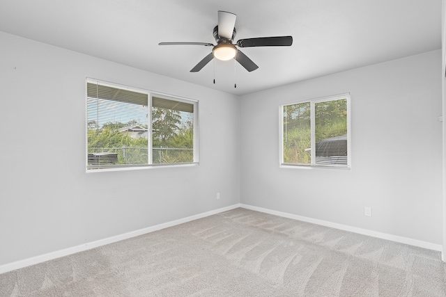 16-2170 Treefern Dr, Pahoa, HI 96778 - carpeted empty room with healthy amount of natural light, baseboards, and a ceiling fan