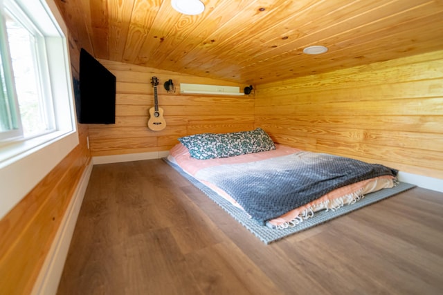 16-1961 Silversword Ct, Pahoa, HI 96778 - bedroom with wood walls, wood finished floors, wooden ceiling, and baseboards