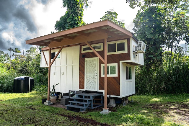 16-1961 Silversword Ct, Pahoa, HI 96778 - view of outdoor structure featuring ac unit