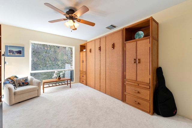 78-7110 Kaluna St Unit 1A, Kailua-Kona, HI 96740 - sitting room featuring carpet floors and ceiling fan