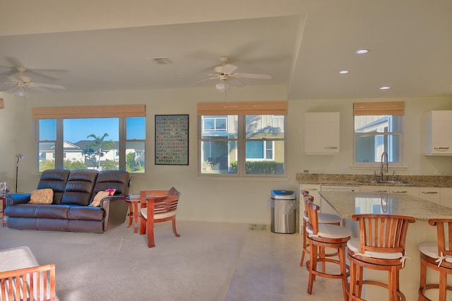 78-6833 Alii Dr Unit E5, Kailua-Kona, HI 96740 - living area featuring a ceiling fan, healthy amount of natural light, baseboards, and recessed lighting