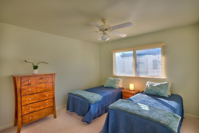 78-6833 Alii Dr Unit E5, Kailua-Kona, HI 96740 - bedroom featuring light carpet, baseboards, and a ceiling fan