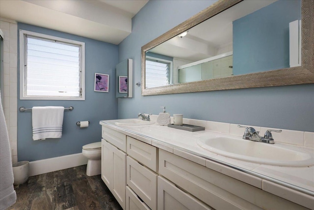 76-6304 Haku Pl, Kailua-Kona, HI 96740 - full bath with a stall shower, double vanity, toilet, wood finished floors, and baseboards