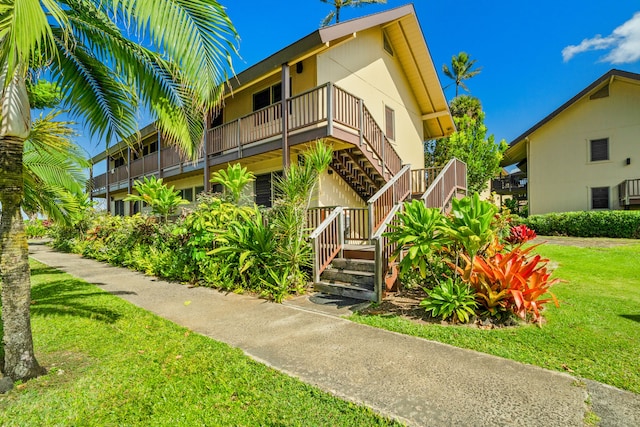 5-7130 Kuhio Hwy Unit C4, Hanalei, HI 96722 - view of building exterior featuring stairway