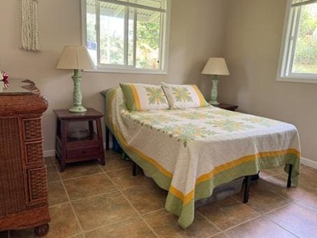 13-1020 Kahukai St, Pahoa, HI 96778 - tiled bedroom with baseboards