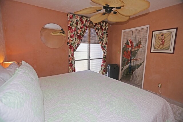 75-6016 Alii Dr Unit 211, Kailua-Kona, HI 96740 - bedroom featuring ceiling fan