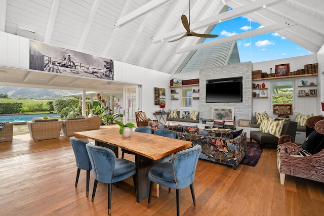 7465-C Koolau Rd, Kilauea, HI 96754 - dining area with high vaulted ceiling, wood finished floors, a ceiling fan, beamed ceiling, and plenty of natural light