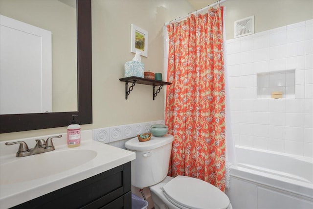 76-6309 Haku Pl, Kailua-Kona, HI 96740 - bathroom featuring vanity, toilet, and shower / bath combo with shower curtain