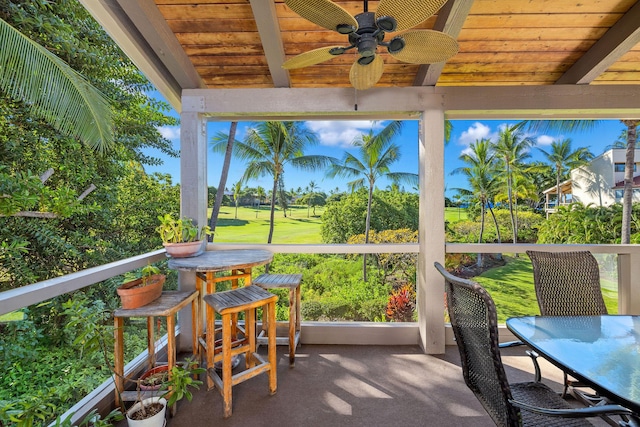 78-6800 Alii Dr Unit 7304, Kailua-Kona, HI 96740 - sunroom featuring wooden ceiling, a ceiling fan, outdoor dining area, and carpet floors
