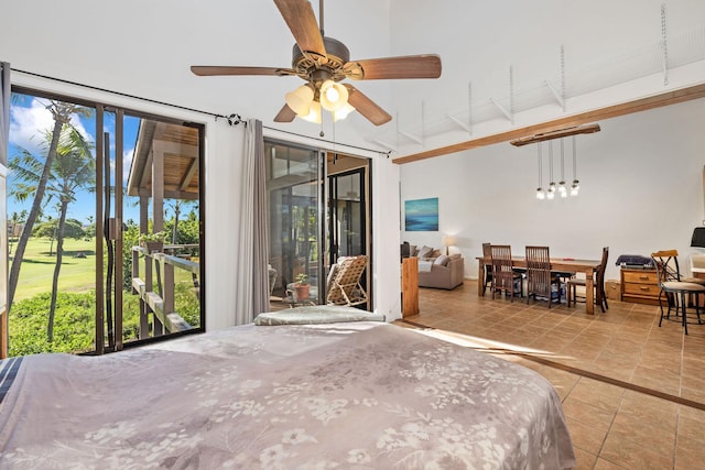 78-6800 Alii Dr Unit 7304, Kailua-Kona, HI 96740 - bedroom with access to outside, tile patterned flooring, and view of golf course