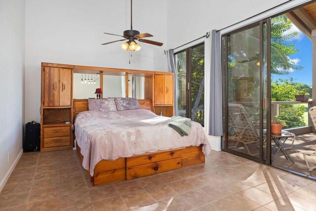 78-6800 Alii Dr Unit 7304, Kailua-Kona, HI 96740 - tiled bedroom with access to outside, multiple windows, a high ceiling, and baseboards