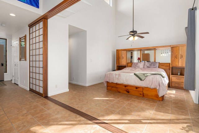 78-6800 Alii Dr Unit 7304, Kailua-Kona, HI 96740 - bedroom with baseboards, a high ceiling, and recessed lighting
