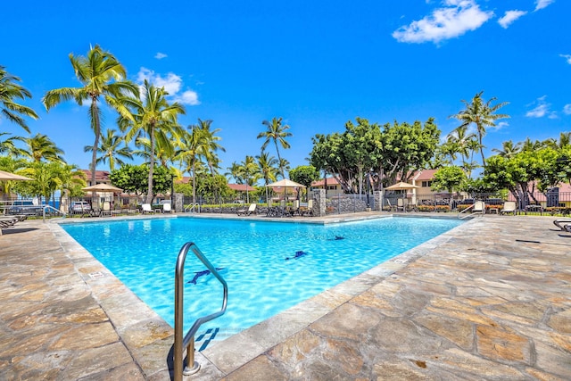 78-6800 Alii Dr Unit 7304, Kailua-Kona, HI 96740 - community pool featuring a patio
