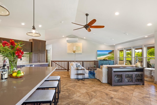 3170 E Iwipoo Rd Unit 2, Kalaheo, HI 96741 - living area with a wall mounted AC, a ceiling fan, lofted ceiling, and recessed lighting
