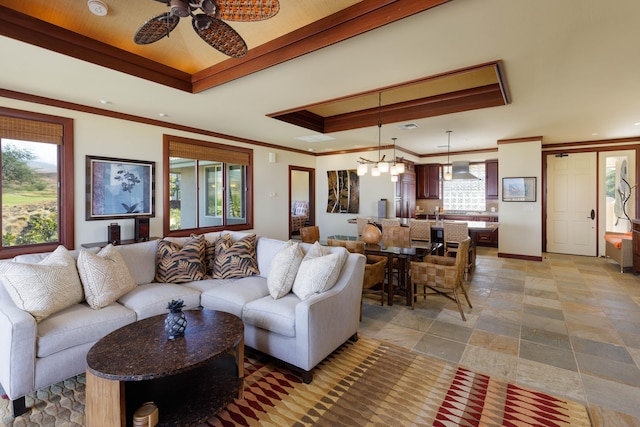 62-3600 Amaui Pl Unit K202, Kamuela, HI 96743 - living area featuring a raised ceiling, a ceiling fan, ornamental molding, and light stone finish floors