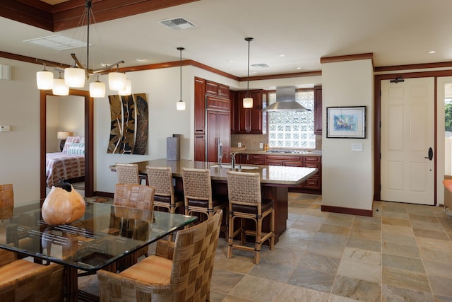 62-3600 Amaui Pl Unit K202, Kamuela, HI 96743 - dining space with baseboards, recessed lighting, ornamental molding, and light stone finish floors