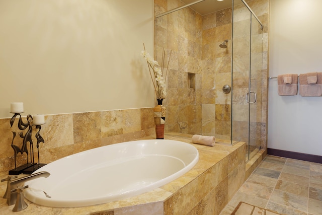 62-3600 Amaui Pl Unit K202, Kamuela, HI 96743 - bathroom featuring a bath, a stall shower, and stone finish flooring