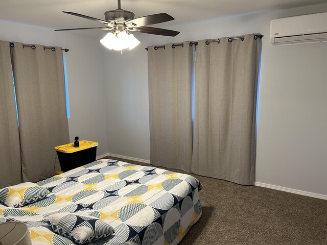 15-1746 7th Ave, Keaau, HI 96749 - carpeted bedroom featuring an AC wall unit, a ceiling fan, and baseboards