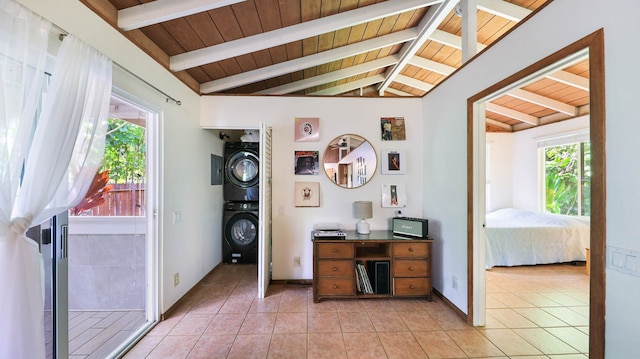 566-A Puuopae Rd, Kapaa, HI 96746 - office area featuring stacked washing machine and dryer, wooden ceiling, light tile patterned floors, and baseboards