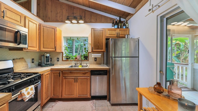 566-A Puuopae Rd, Kapaa, HI 96746 - kitchen with appliances with stainless steel finishes, a sink, light countertops, wooden ceiling, and backsplash