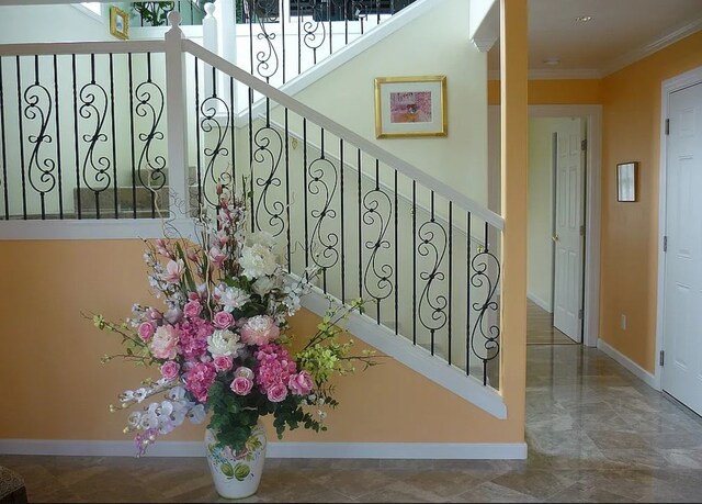 1890 Kaiao St, Hilo, HI 96720 - stairway featuring ornamental molding and baseboards