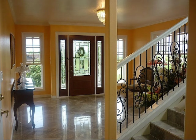 1890 Kaiao St, Hilo, HI 96720 - entryway featuring a chandelier, plenty of natural light, stairway, crown molding, and baseboards