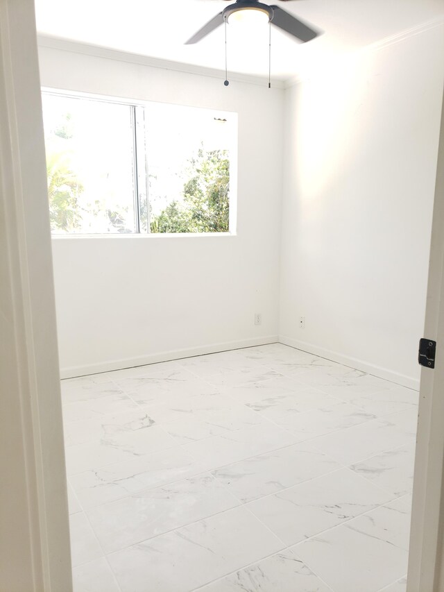15-1826 32nd Ave, Keaau, HI 96749 - unfurnished room featuring marble finish floors, a ceiling fan, baseboards, and crown molding