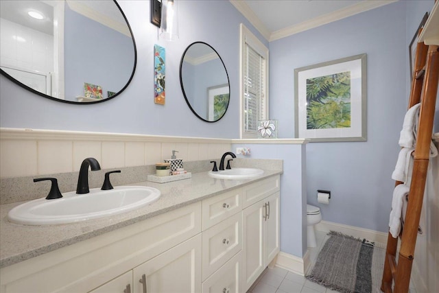 78-6804 Kuhinanui St, Kailua-Kona, HI 96740 - bathroom featuring toilet, double vanity, crown molding, tile patterned flooring, and wainscoting