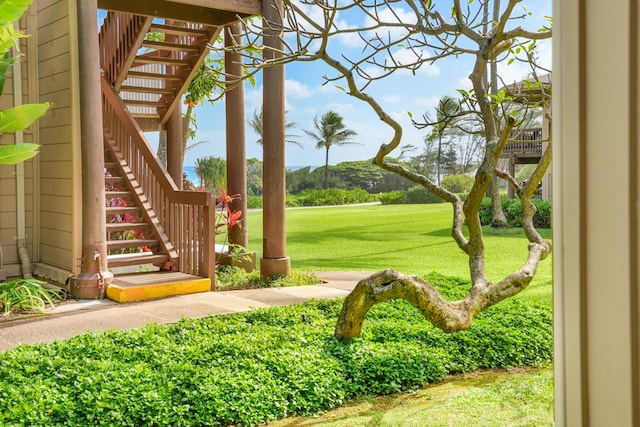 4460 Nehe Rd Unit 116, Lihue, HI 96766 - view of grassy yard featuring stairs and view of golf course