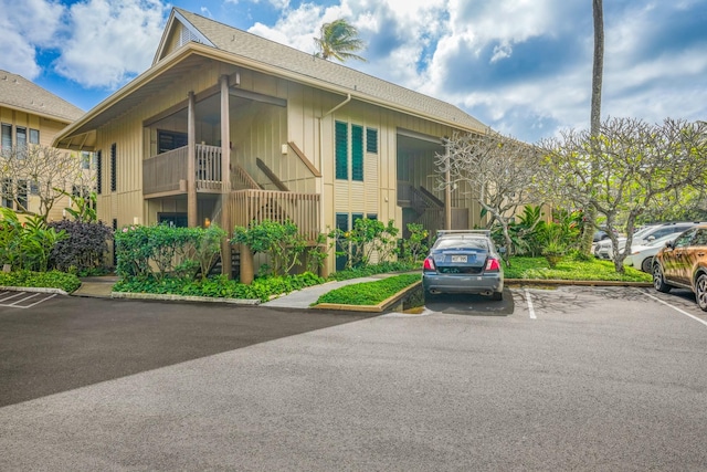 4460 Nehe Rd Unit 116, Lihue, HI 96766 - view of building exterior with uncovered parking