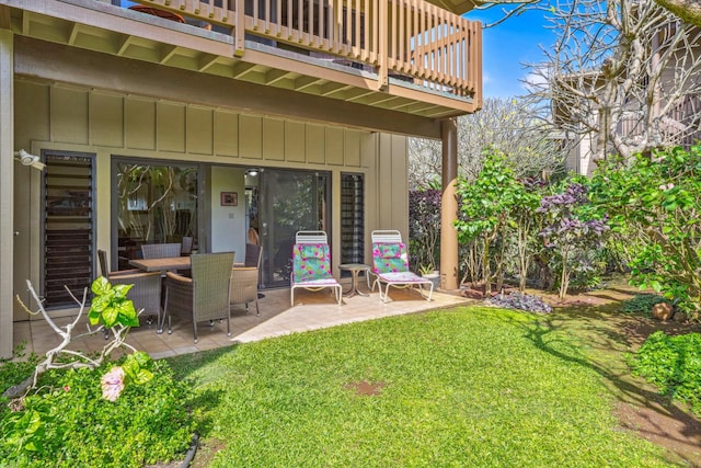 4460 Nehe Rd Unit 116, Lihue, HI 96766 - view of grassy yard featuring a balcony and a patio area